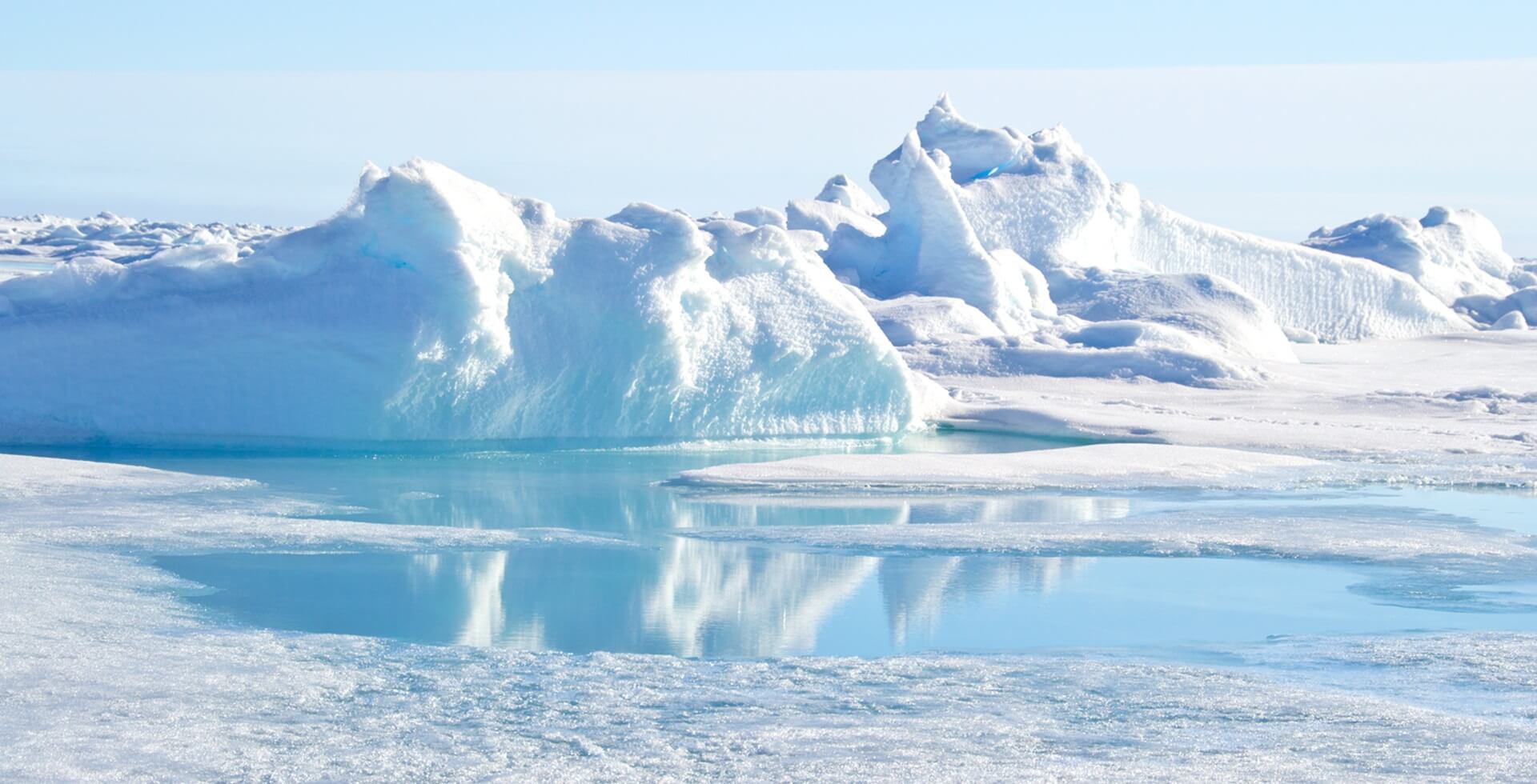 Footer Pressão e água derretida no Pólo Norte Geográfico